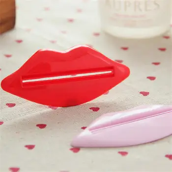 Предпочитан материал за сокове паста за зъби, лесен за използване, многофункционален, на нова форма, домакински прижимная машина, Съраунд два цвята, по желание червен